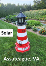 May include: A red and white striped lighthouse with a black roof and a solar panel on top. The lighthouse is on a green lawn with the words &#39;Solar&#39; and &#39;Assateague, VA&#39; printed below it.
