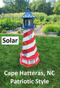 May include: A red, white, and blue lighthouse with a solar powered light. The lighthouse is painted with red and white stripes and has a blue roof. The lighthouse is labeled &#39;Solar&#39;, &#39;Cape Hatteras, NC&#39;, and &#39;Patriotic Style&#39;.